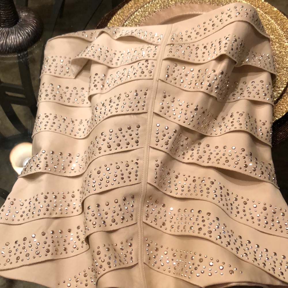 Studded champagne bustier.